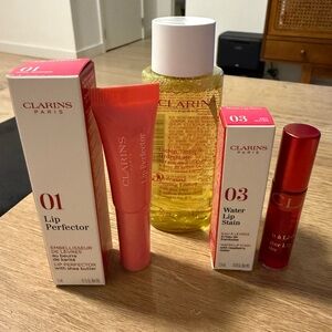 Clarins 3pc Set Lip Perfector, Wet Lip Oil, Hydrating Toning Lotion